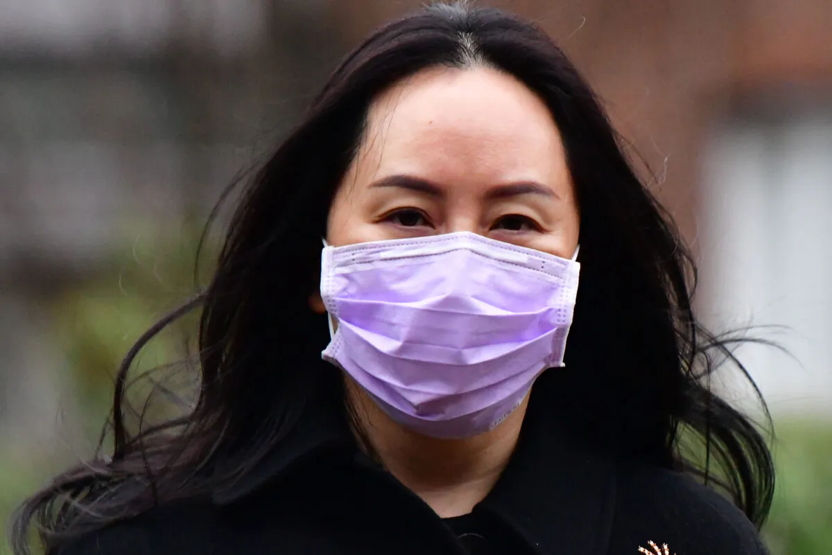 Huawei Chief Financial Officer, Meng Wanzhou, leaves her Vancouver home to attend British Columbia Supreme Court, in Vancouver, British Columbia, on January 12, 2021. (Don MacKinnon / AFP via Getty Images)