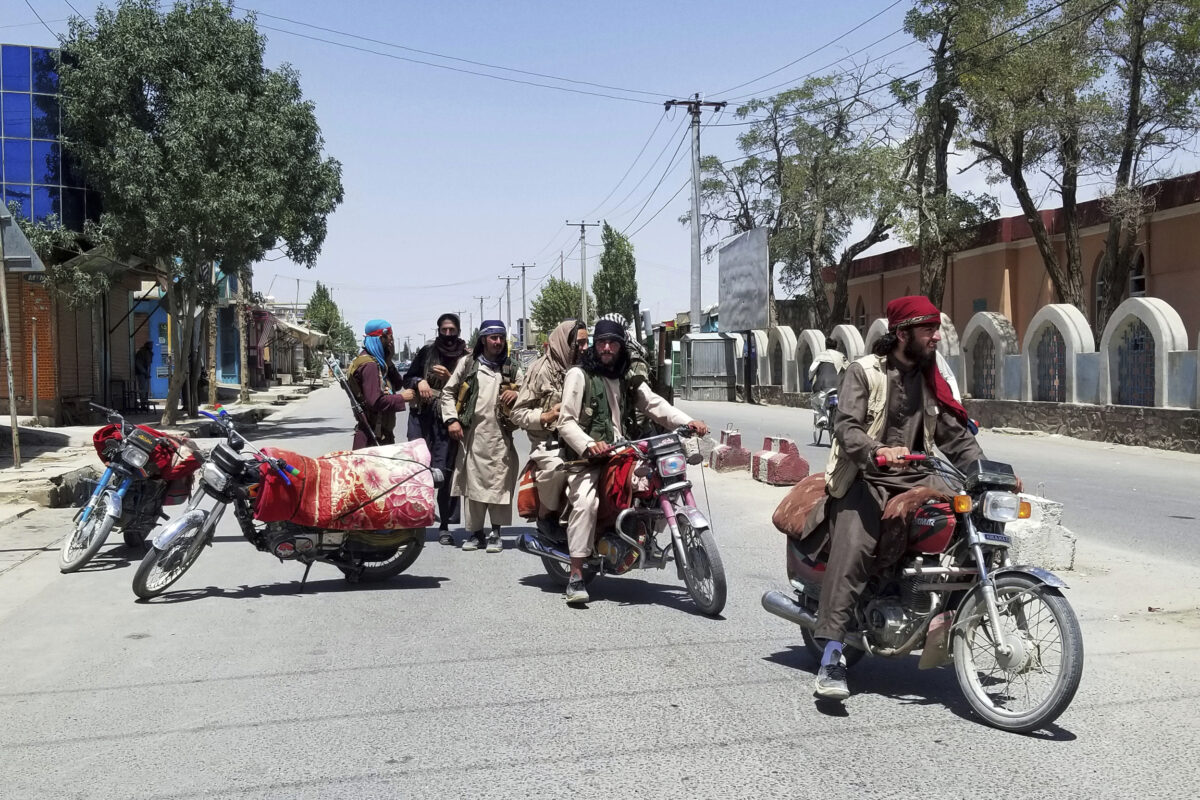 Taliban on bike