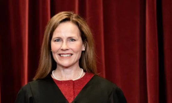 Supreme Court’s Barrett Says Justices Should Turn ‘National Temperature Down’