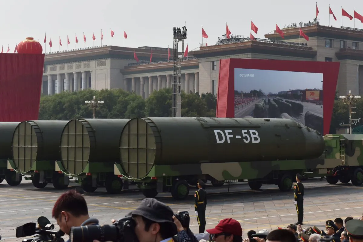 Military vehicles carrying DF-5B intercontinental ballistic missiles participate in a military parade at Tiananmen Square in Beijing on Oct. 1, 2019. (Greg Baker/AFP via Getty Images)