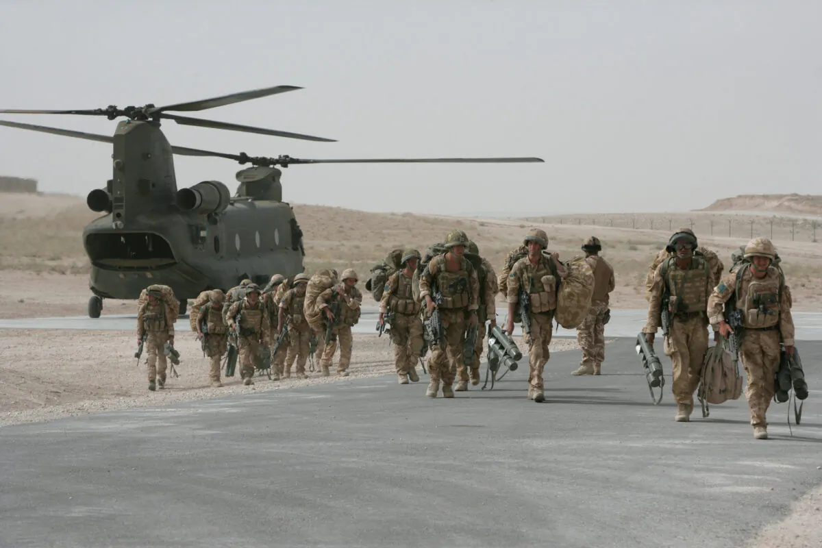 In this file image, British paratroopers from 3rd Battalion The Parachute Regiment arrive at Camp Eagle in the Zabul Province, Afghanistan, on June 17, 2008. (Marco Di Lauro/Getty Images)