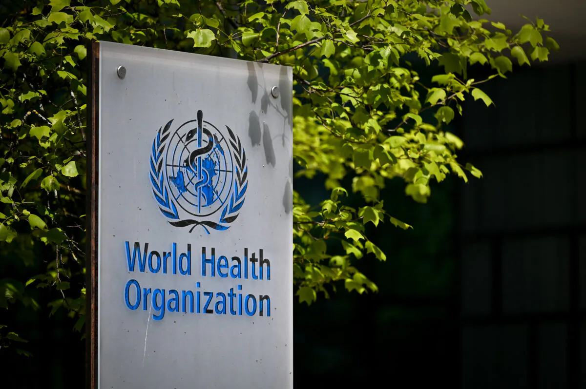 A sign of the World Health Organization (WHO) at the entrance of its headquarters in Geneva, on May 8, 2021. (Fabrice Coffrini/AFP via Getty Images)
