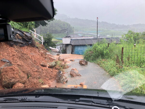 A landslide in Kure, Hiroshima Prefecture, Japan after heavy rains, in this August 13, 2021 photo obtained from social media