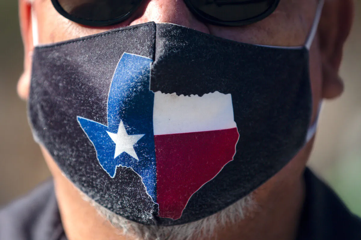 A man wears a Texas mask in Austin, Texas, on March 3, 2021. (Montinique Monroe/Getty Images)