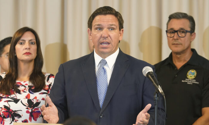 Florida Governor Ron DeSantis answers questions related to school openings and the wearing of masks,Tuesday, Aug. 10, 2021, in Surfside, Fla. (AP Photo/Marta Lavandier)