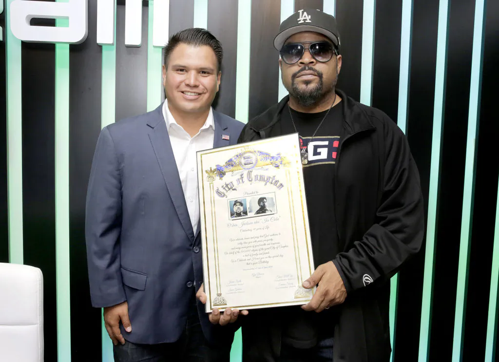 Compton City Council member Isaac Galvan presents Ice Cube with a "Celebration of Life" award from the City of Compton, in Los Angeles on June 14, 2018.  (Rachel Murray/Getty Images for Dream Hollywood)