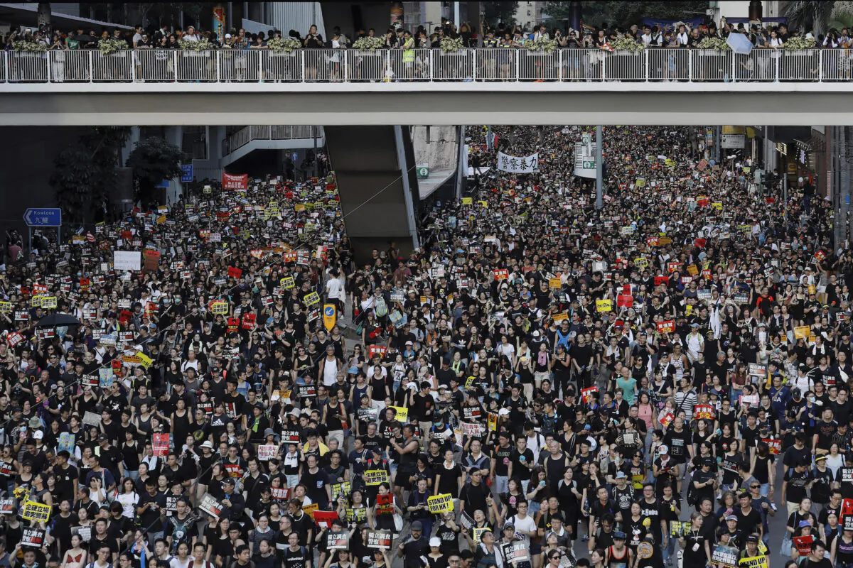 Protesters take part in a rally in Hong Kong on July 1, 2019. (Vincent Yu/AP Photo)