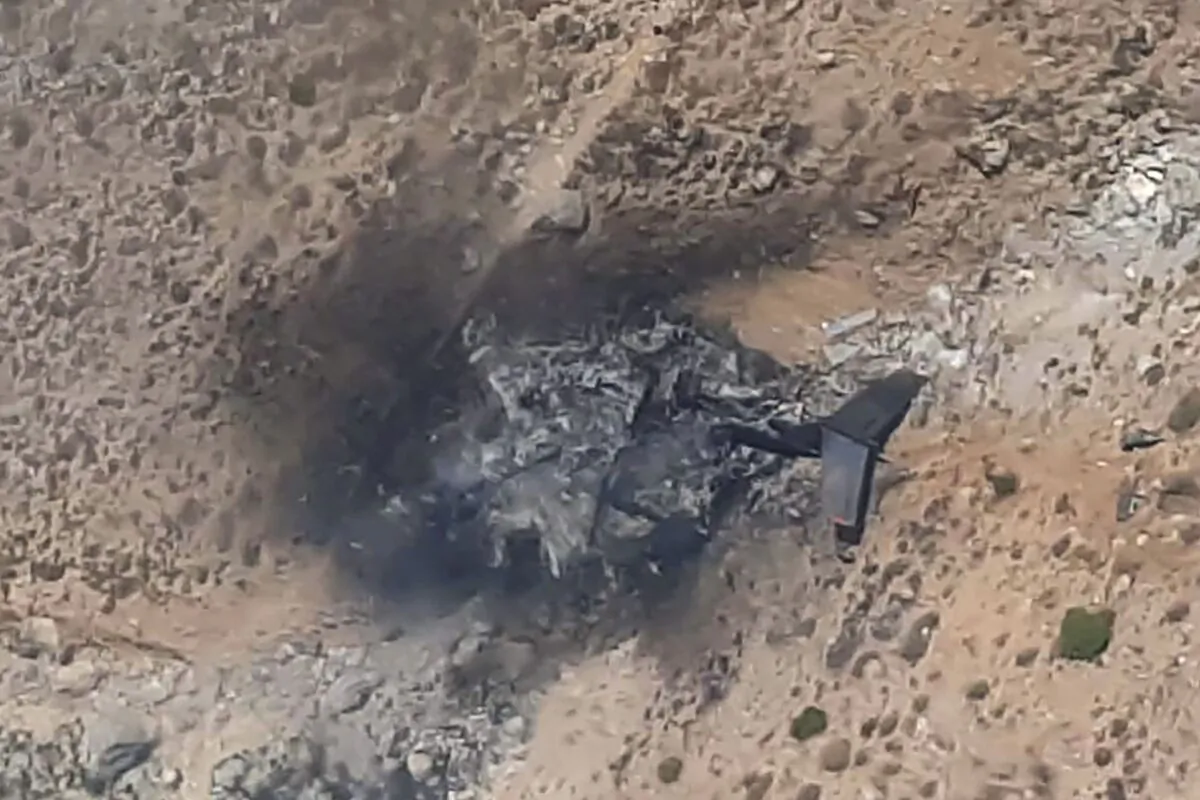 This screenshot shows a general view of the wreckage of a Russian Bombadier Be-200 aircraft at Kahramanmaras, southern Turkey, on Aug. 14, 2021. (Demiroren News Agency (DHA)/AFP via Getty Images)
