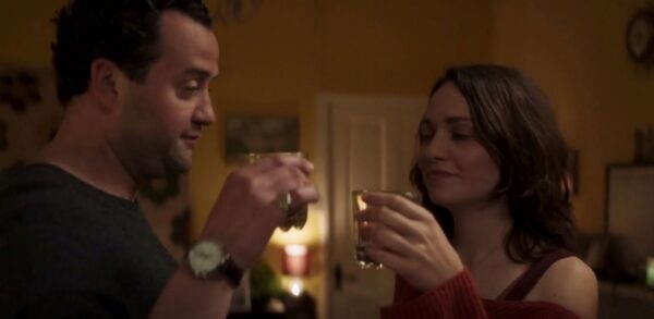 man and woman having a toast