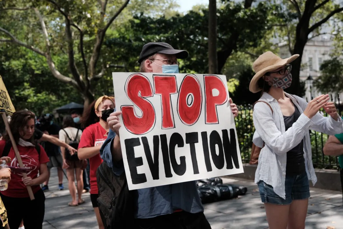 Activists hold a protest against evictions near City Hall in New York City, on Aug. 11, 2021. (Spencer Platt/Getty Images)