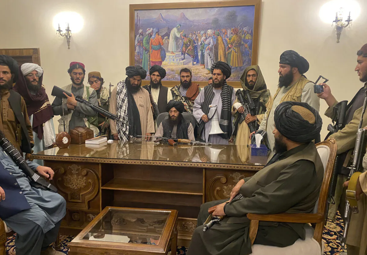 Taliban terrorists take control of Afghan's presidential palace after Afghan President Ashraf Ghani fled the country, in Kabul, Afghanistan, on Aug. 15, 2021. (Zabi Karimi/AP Photo)