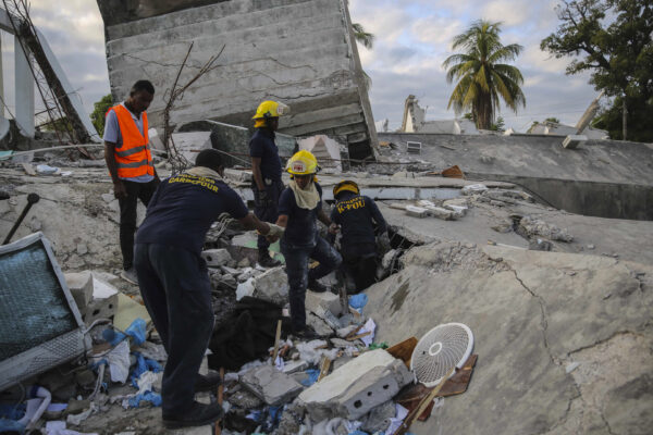 Firefighters search for survivors i