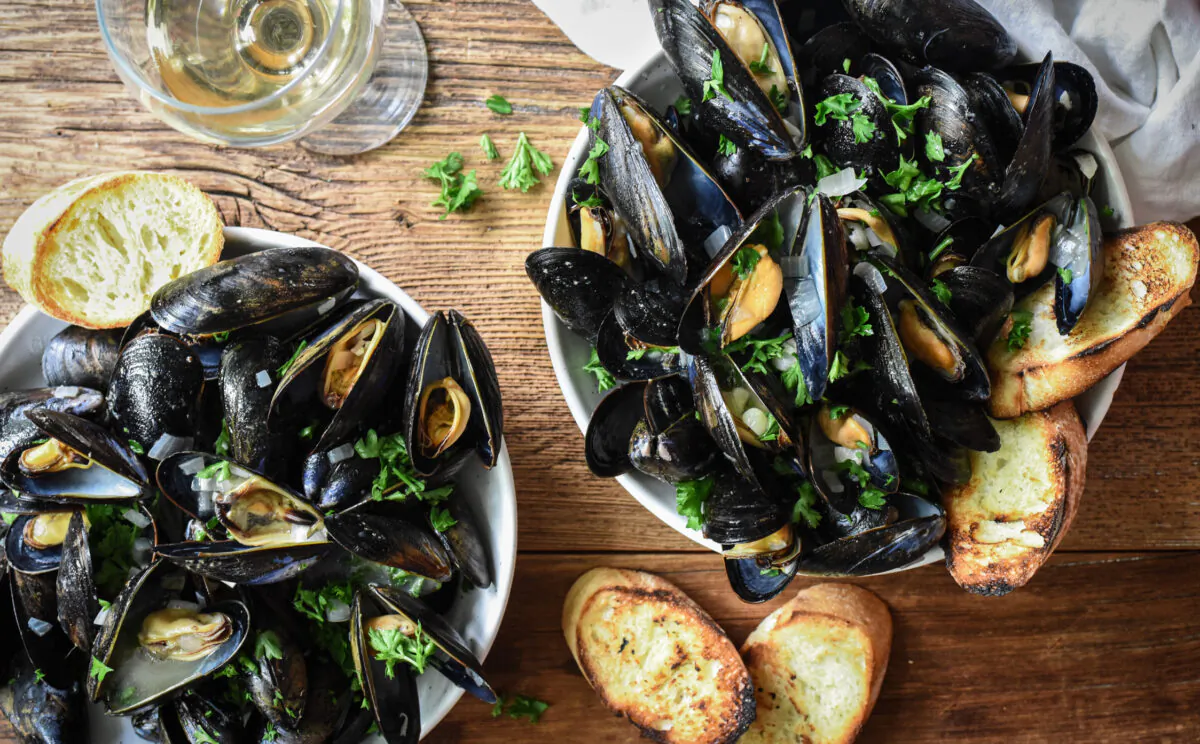 Serve these mussels immediately, with plenty of bread for dipping and the wine left in the bottle for sipping. (Audrey Le Goff)