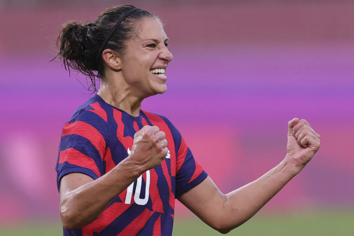 Carli Lloyd of the United States celebrates scoring their fourth goal during the Tokyo 2020 Olympic Games women's bronze medal football match between Australia and the United States at Ibaraki Kashima Stadium in Kashima city, Ibaraki prefecture, Japan, on Aug. 5, 2021. (Henry Romero/Reuters)