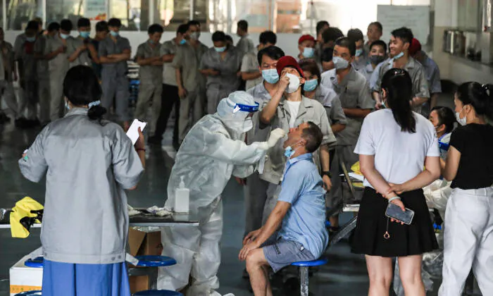 Son of Wuhan COVID-19 Victim Insists on Holding CCP Accountable, Is Threatened by Police