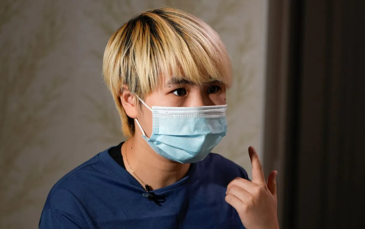 Wu Huan speaks during an interview in a safe house in the Ukraine on June 30, 2021. (AP Photo)