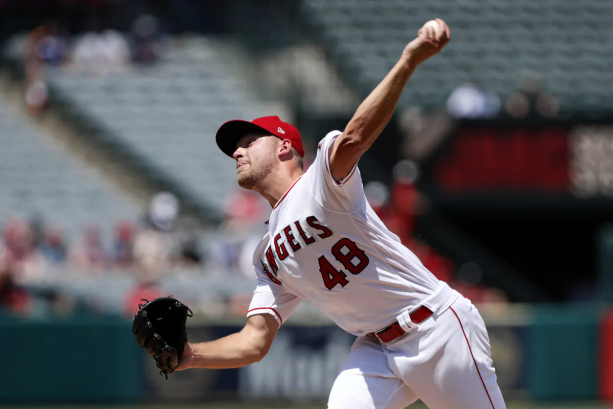 Los Angeles Angels starting pitcher Reid Detmers throws to a Houston Astros batter during the second inning of a baseball game in Anaheim, Calif., on Aug. 15, 2021. (AP Photo/Alex Gallardo)
