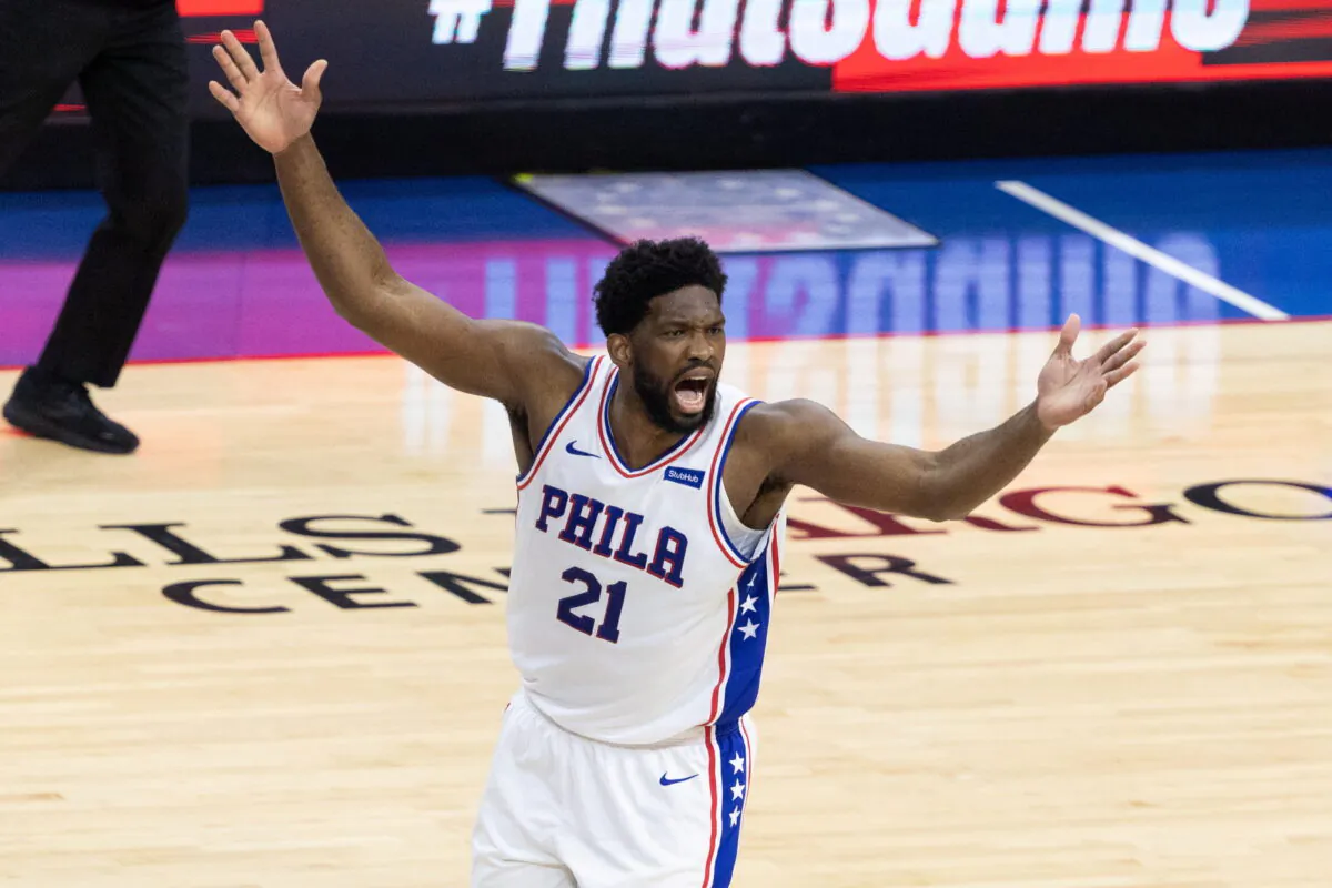 Philadelphia 76ers center Joel Embiid (21) reacts after scoring against the Atlanta Hawks during the first quarter of game seven of the second round of the 2021 NBA Playoffs at Wells Fargo Center in Philadelphia, Pa., on June 20, 2021. (Bill Streicher/USA TODAY Sports via Reuters)