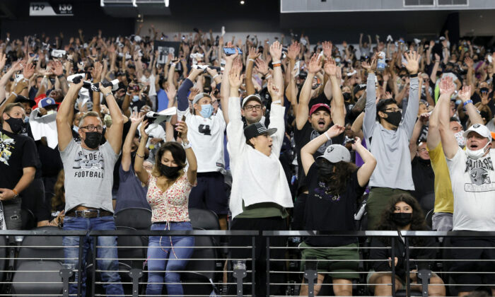 Fans do the wave during a preseason game between the Seattle Seahawks and the Las Vegas Raiders at Allegiant Stadium on Aug. 14, 2021 in Las Vegas, Nevada. (Ethan Miller/Getty Images)