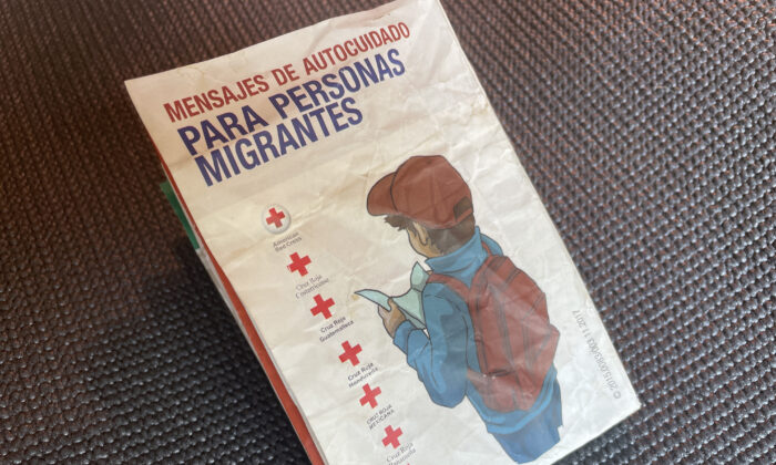 A Spanish-language pamphlet published by the Red Cross titled ÔMessages of Self-Help for MigrantsÕ was being carried by an illegal immigrant in Uvalde, Texas. (Charlotte Cuthbertson/The Epoch Times)