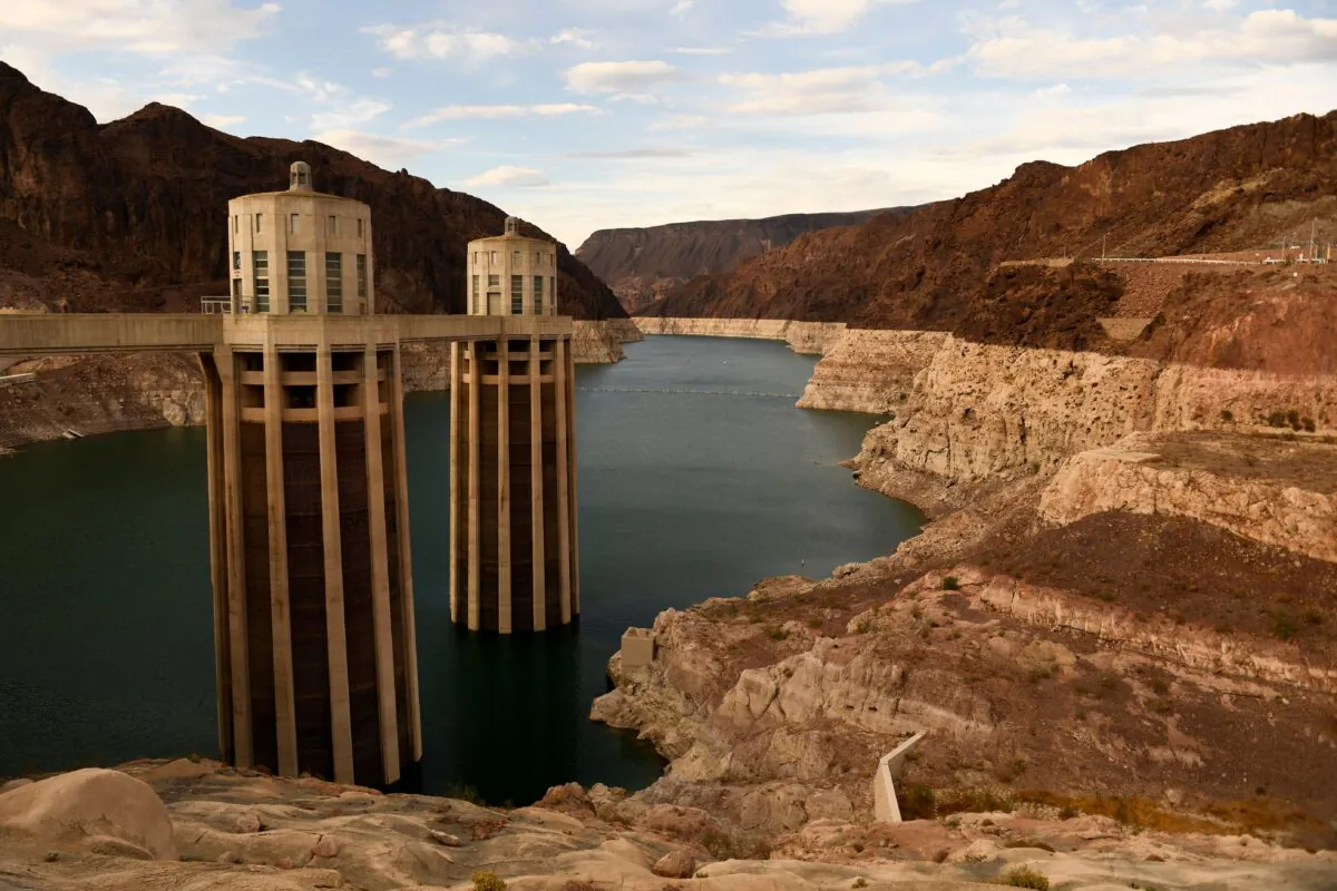 Intake towers for water to enter to generate electricity and provide hydroelectric power stand during low water levels due the western drought on July 19, 2021 at the Hoover Dam on the Colorado River at the Nevada and Arizona state border. (Patrick T. Fallon/AFP via Getty Images)