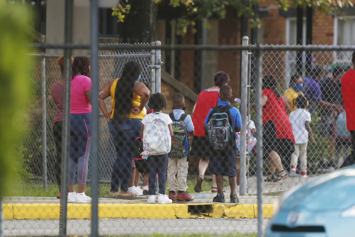 Students return to school at Seminole Heights Elementary School after the Florida Department of Education mandated that all schools must have in-class learning during the week in Tampa, Florida, on August 31, 2020. (Octavio Jones/Getty Images)