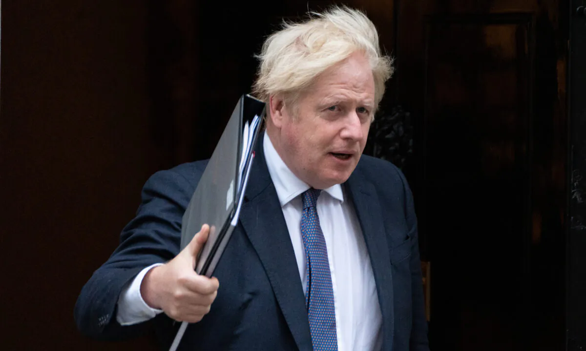 Prime Minister Boris Johnson leaves 10 Downing Street in London on Aug. 18, 2021. (Stefan Rousseau/PA)