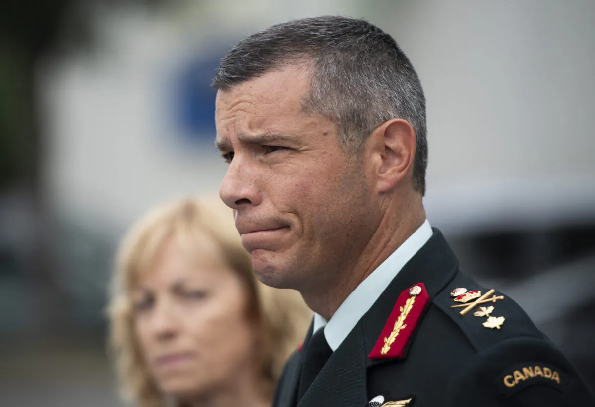Maj.-Gen. Dany Fortin speaks to reporters outside the Gatineau Police Station after being processed, in Gatineau, Que., on Aug. 18, 2021. (The Canadian Press/Justin Tang)