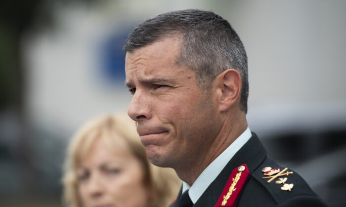 Maj.-Gen. Dany Fortin speaks to reporters outside the Gatineau Police Station after being processed, in Gatineau, Que., on Aug. 18, 2021. (The Canadian Press/Justin Tang)