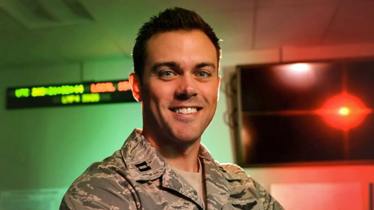 Lt. Col. Matthew Lohmeier, then a Captain, stands in the Standardized Space Trainer on Buckley Air Force Base, Colo., on July 22, 2015. (Darren Scott/U.S. Air Force)