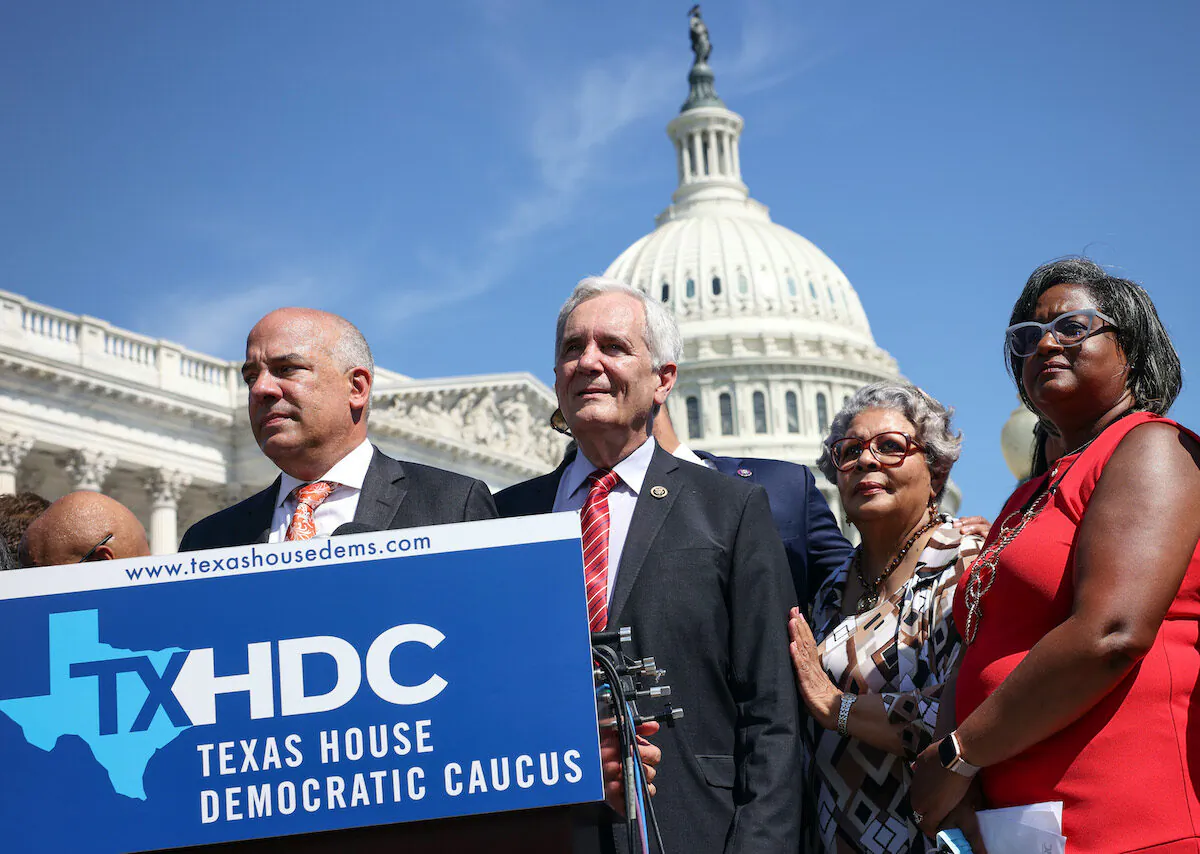 Texas State Democrats (L-R) Democratic Chair Rep. Chris Turner (TX-101), Rep. Rafael Anchia (TX-103), Rep. Senfronia Thompson (TX-141), and Rep. Rhetta Bowers (TX-113) at a news conference outside the U.S. Capitol on July 13, 2021. More than 60 Texas House Democrats left the state to Washington, DC, to block a voting restrictions bill by denying a Republican quorum. (Kevin Dietsch/Getty Images)