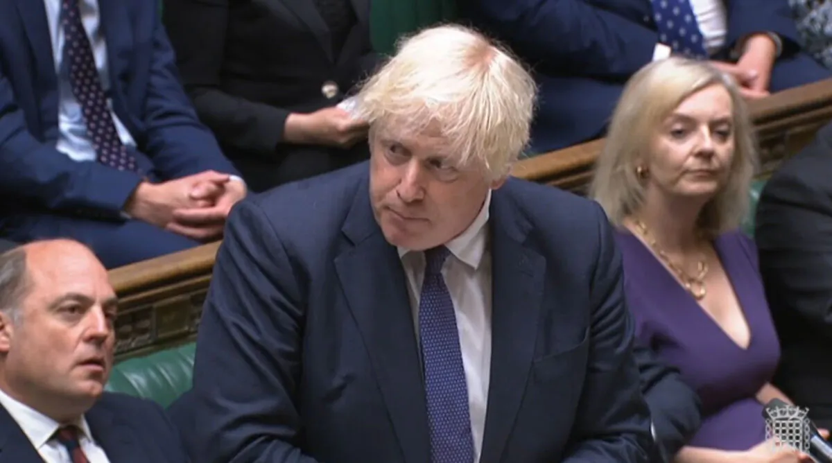 Prime Minister Boris Johnson speaking during the debate on the situation in Afghanistan in the House of Commons, as MPs returned to Parliament from their summer break for an emergency sitting, in London on Aug. 18, 2021. (PA/Parliament TV)