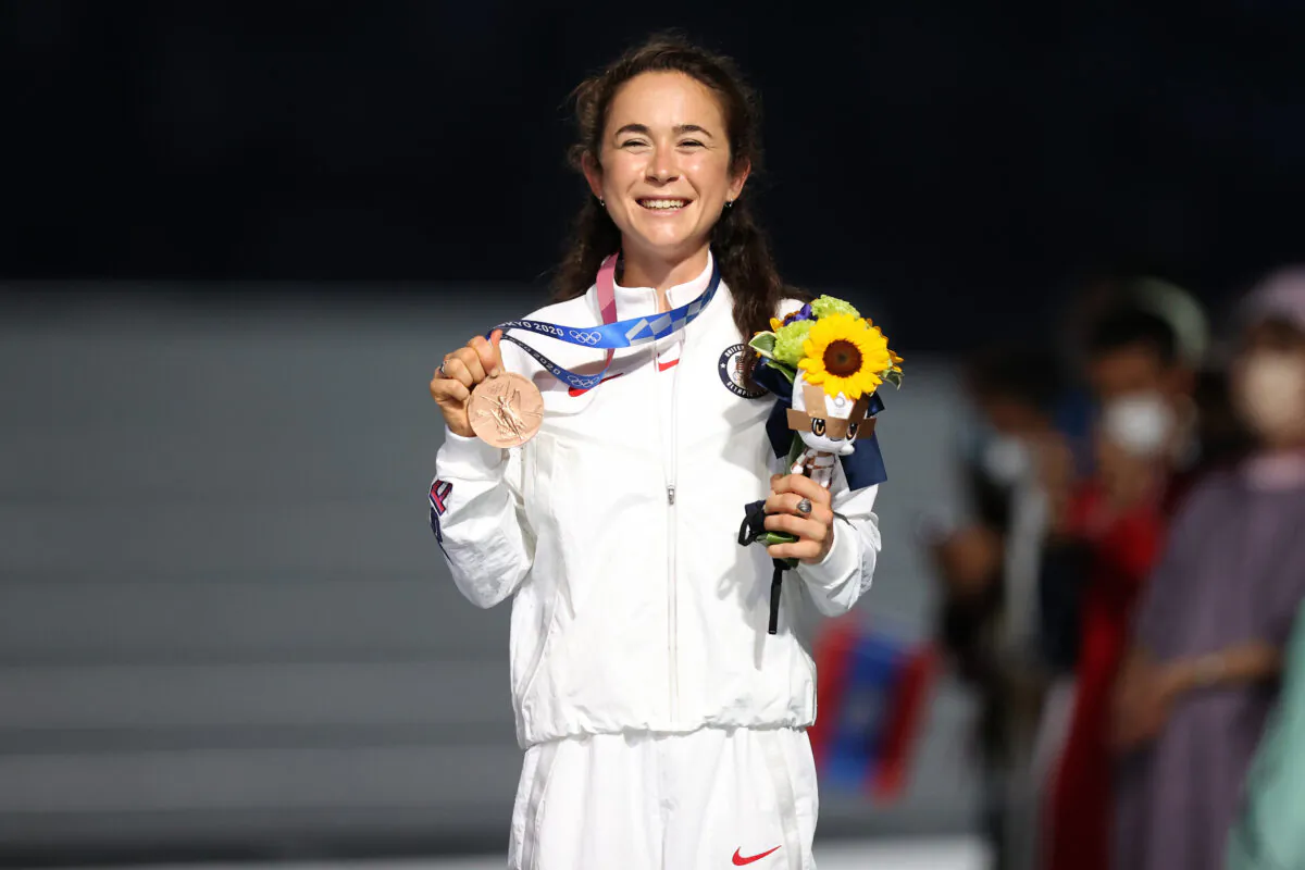 Bronze medalist Molly Seidel of Team United States pose during the medal ceremony for the Women's Marathon Final during the Closing Ceremony of the Tokyo 2020 Olympic Games at Olympic Stadium in Tokyo, Japan, on Aug. 8, 2021. (Naomi Baker/Getty Images)