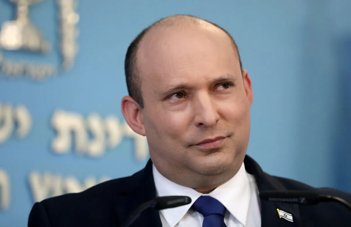 Israeli Prime Minister Naftali Bennett makes a media statement for the COVID-19 pandemic status, at the Prime minister's office in Jerusalem, on Aug. 18, 2021. (Abir Sultan/Pool via Reuters)
