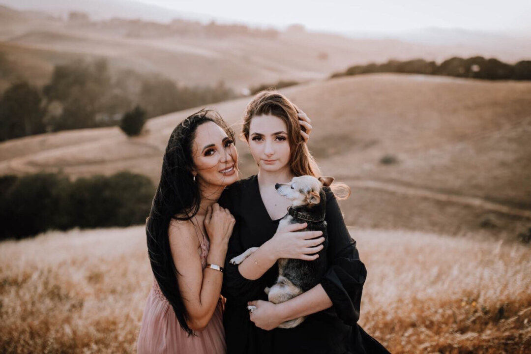 Angela Marie Wulbrecht, pictured with daughter Gabriella, suffered a severe reaction after her COVID-19 vaccination that has left her unable to work. She hopes the federal government will create a compensation program that pays for damages, medical bills, and lost wages to people who can demonstrate they suffered a serious COVID-19 vaccine injury. (Vera Frances Photography)