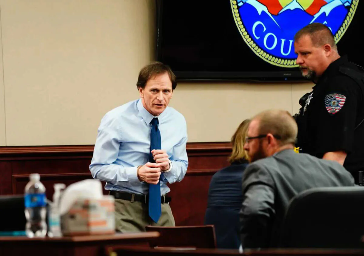 Defendant Alex Ewing enters the court for his murder trial, in an Arapahoe County Court in Centennial, Colo., on July 27, 2021. (Philip B. Poston/Pool/Sentinel Colorado via AP)