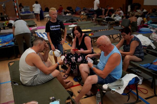 evacuated-campers-play-cards