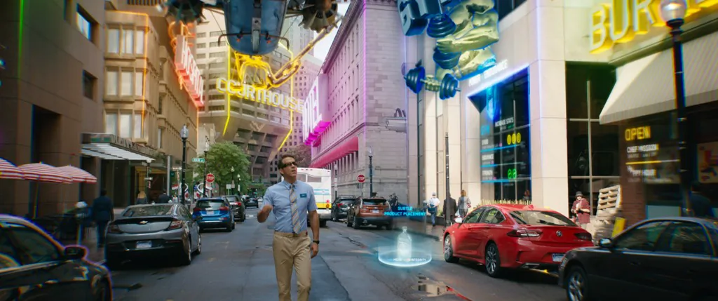 Ryan Reynolds plays a fictional character, in the “Free City” video game, who discovers that he's not real in "Free Guy." (20th Century Studios)