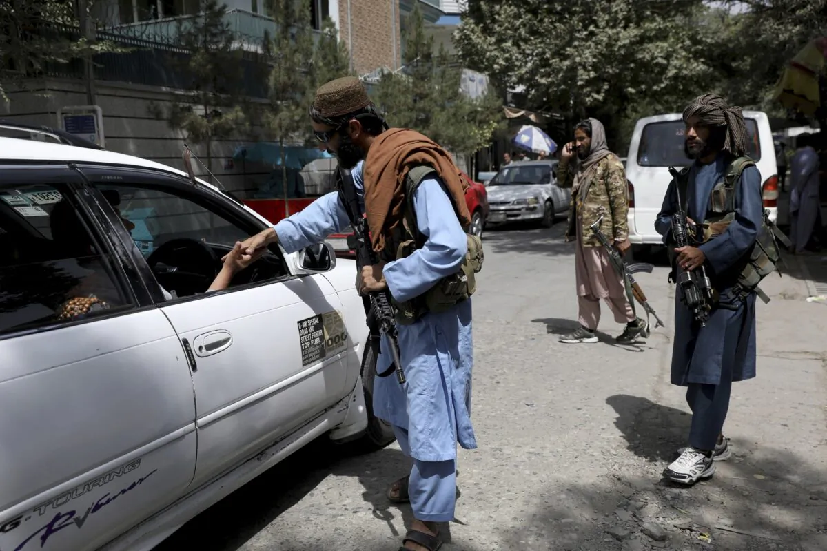Taliban extremists man a checkpoint in Kabul, Afghanistan, on Aug. 18, 2021. (Rahmat Gul/AP Photo)