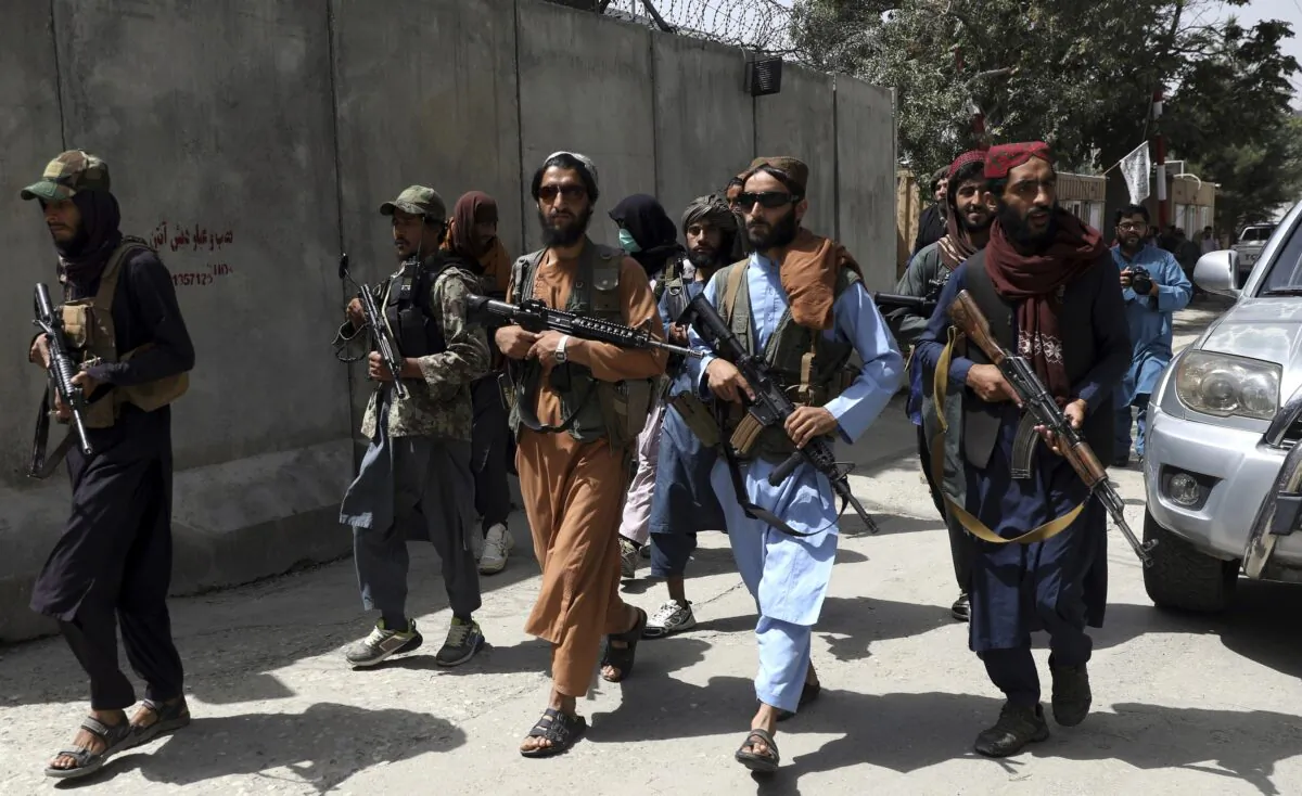 Taliban terrorists patrol in a neighborhood in Kabul, Afghanistan, on Aug. 18, 2021. (Rahmat Gul/AP Photo)