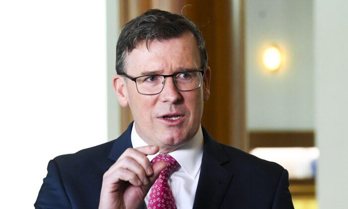 Australian Education Minister Alan Tudge speaks to the media during a press conference at Parliament House in Canberra, Australia, on Aug. 4, 2021. (AAP Image/Lukas Coch)