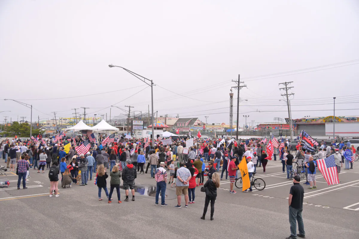 People participate in a Reopen New Jersey protest attended by many Trump supporters in Point Pleasant, N.J., on May 25, 2020. (Michael Loccisano/Getty Images)
