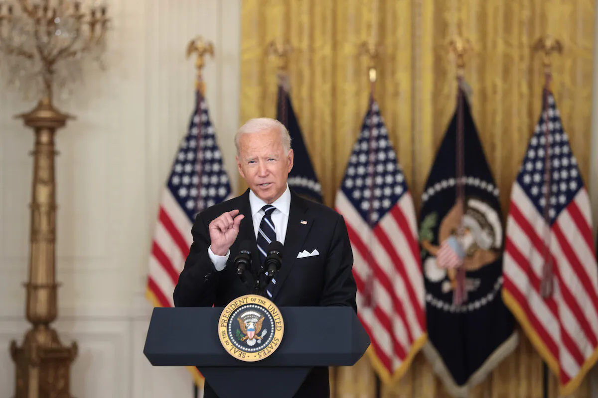U.S. President Joe Biden gestures as he delivers remarks on the COVID-19 response and the vaccination program in the East Room of the White House on Aug. 18, 2021. (Anna Moneymaker/Getty Images)