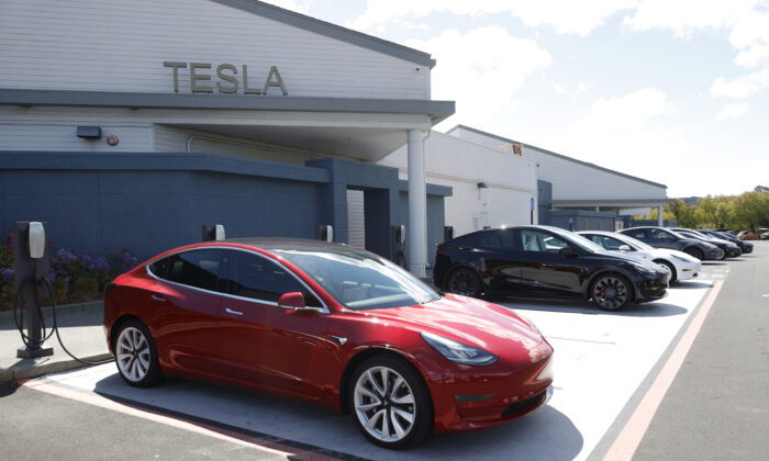 Tesla Reports Quarterly Earnings