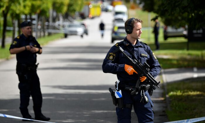 Police are on the lookout for an attack at a high school in Eslov, Sweden, on August 19, 2021.  (Johan Nilsson / TT News Agency via AP)