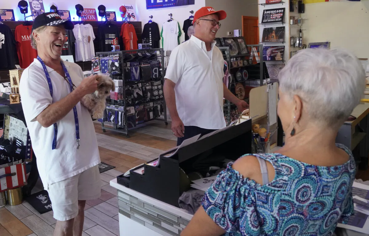 Atlanta resident Norm Hatke (left), Jon Oudin (center), and Fran Diemer chat at the Ellijay Trump Store in Georgia on Aug. 18, 2021. (Jackson Elliott/The Epoch Times)
