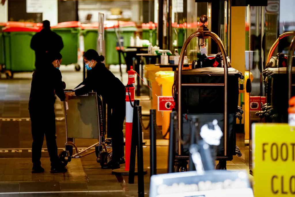 Staff at the Novotel Ibis Hotel in Melbourne, Australia, on June 9, 2021. (Darrian Traynor/Getty Images)