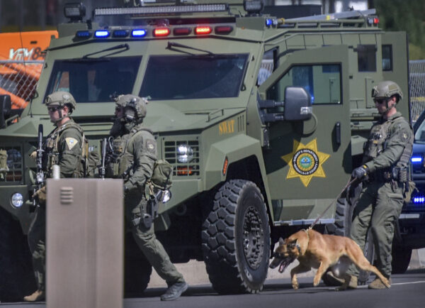 Tactical officers search for suspect