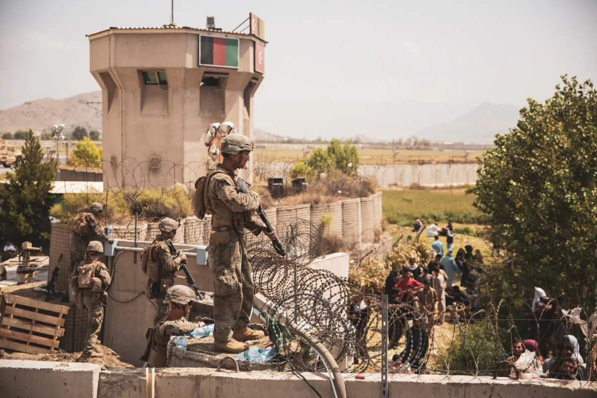 U.S. Marines stand guard at an Evacuee Control Checkpoint at Hamid Karzai International Airport, Kabul, Afghanistan, on Aug. 20, 2021. (Sgt. Victor Mancilla/U.S. Marine Corps/Handout via Reuters)