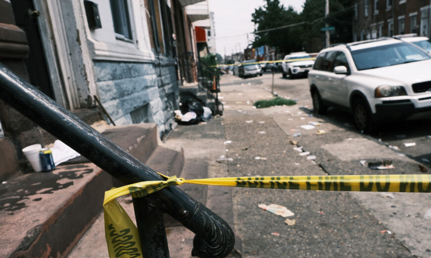 Police tape blocks a street where a person was shot in a drug related event in Philadelphia, Pa., on July 19, 2021. (Spencer Platt/Getty Images)